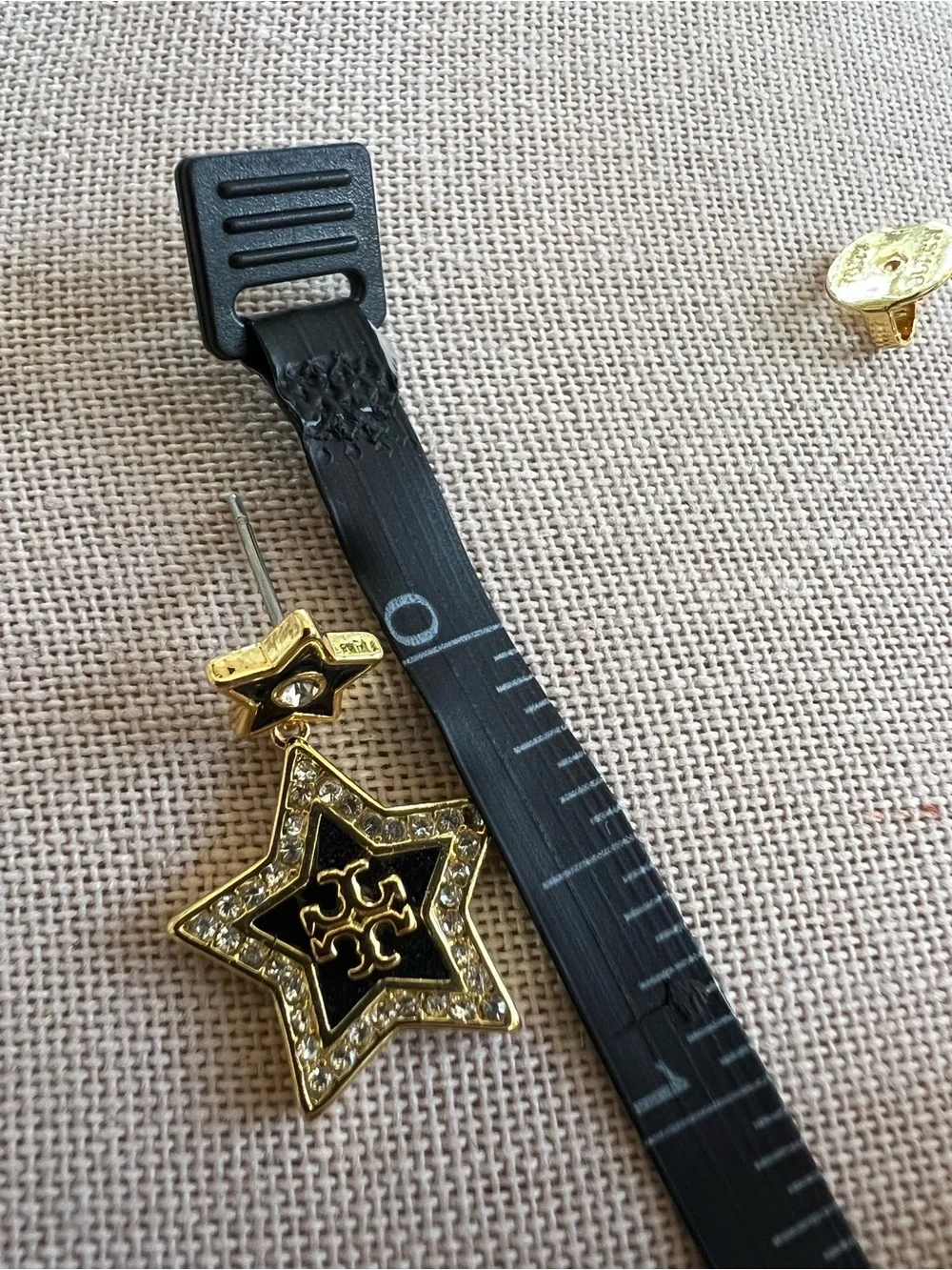 Tory Burch Black and Gold Star Drop Earrings with Crystal Accents